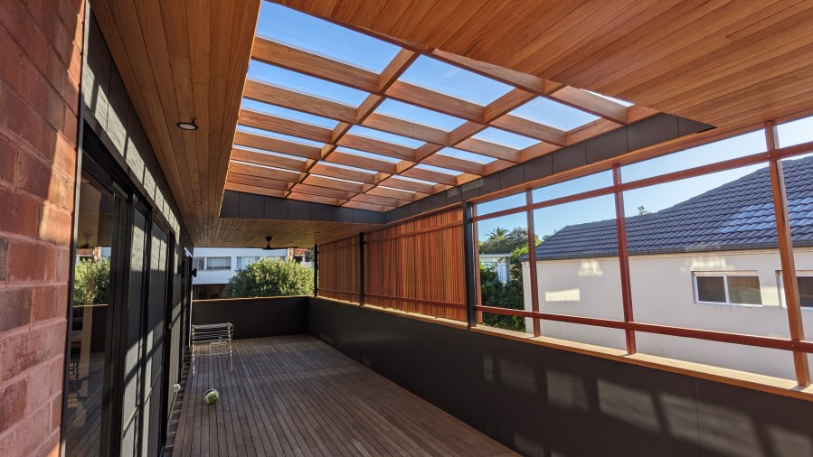 "Renovation and extension project by local builders in Newcastle" "Outdoor deck and timber cladding, completed home extension project" Architect - Jodie Dixon